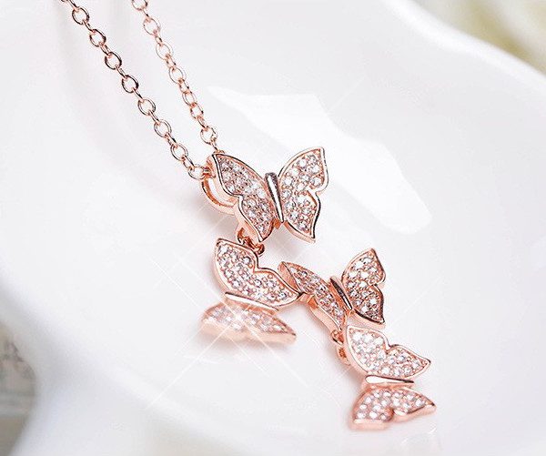ROSE GOLD MULTI BUTTERFLY DROP NECKLACE